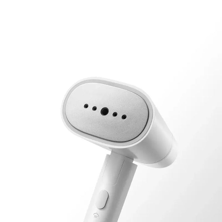 Tavvitaimp18 portable steamer & iron. Powerful garment wrinkle remover and mite killer for fresh, smooth clothes.