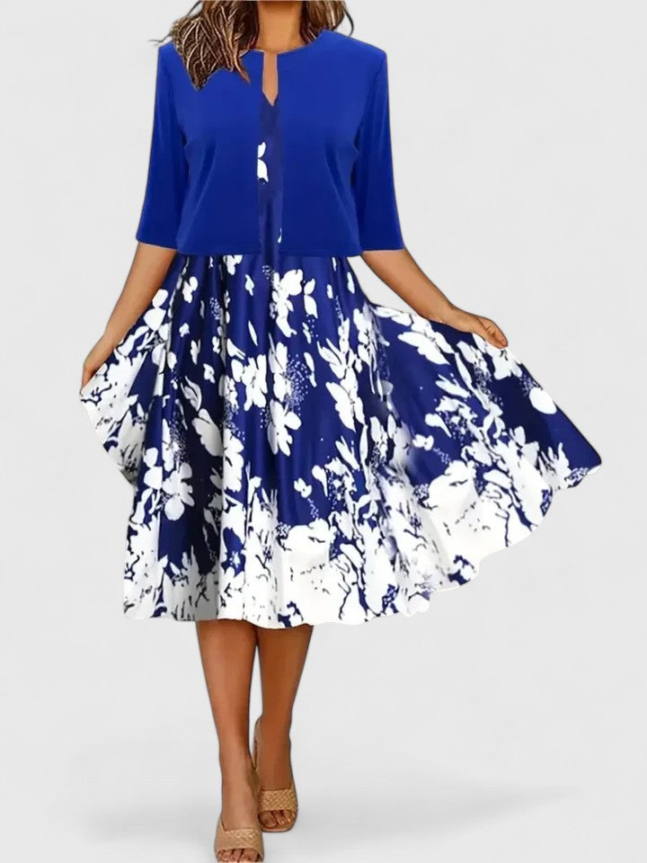 Women's elegant A-line midi dress, floral print, colorblock. Ideal party or occasion wear for spring & summer.