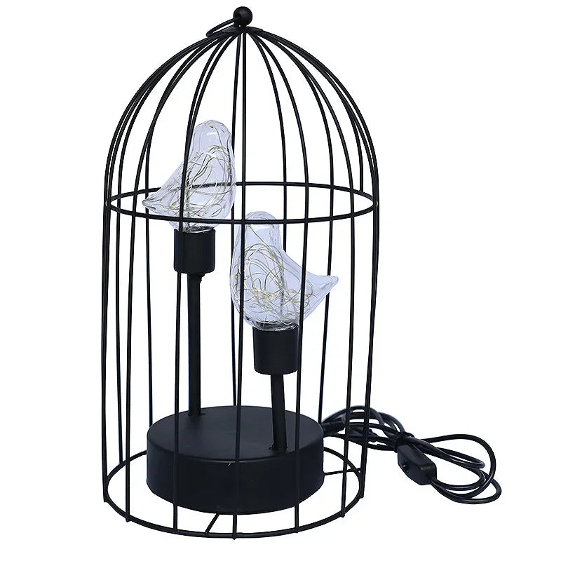 Versatile birdcage LED table lamp with warm glow. Battery/USB for flexible placement. Great decorative home accent.