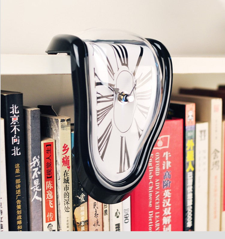 Elegant gold sculptural art clock, a modern and unique accent for any room.