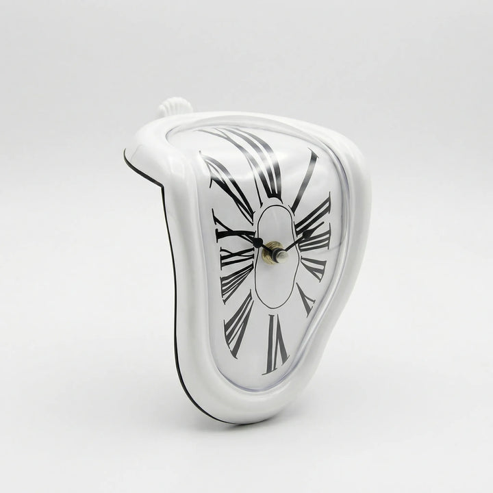 Decorative gold mantel clock, sculptural and surreal design for stylish home decor.