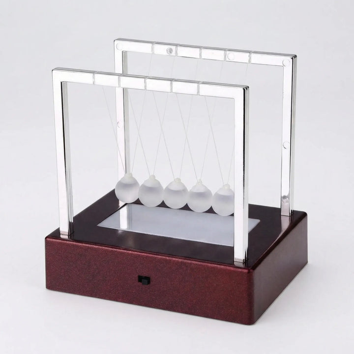 Modern motion ornament for desks, showcasing a vibrant color-changing LED display, an ideal unique gift.