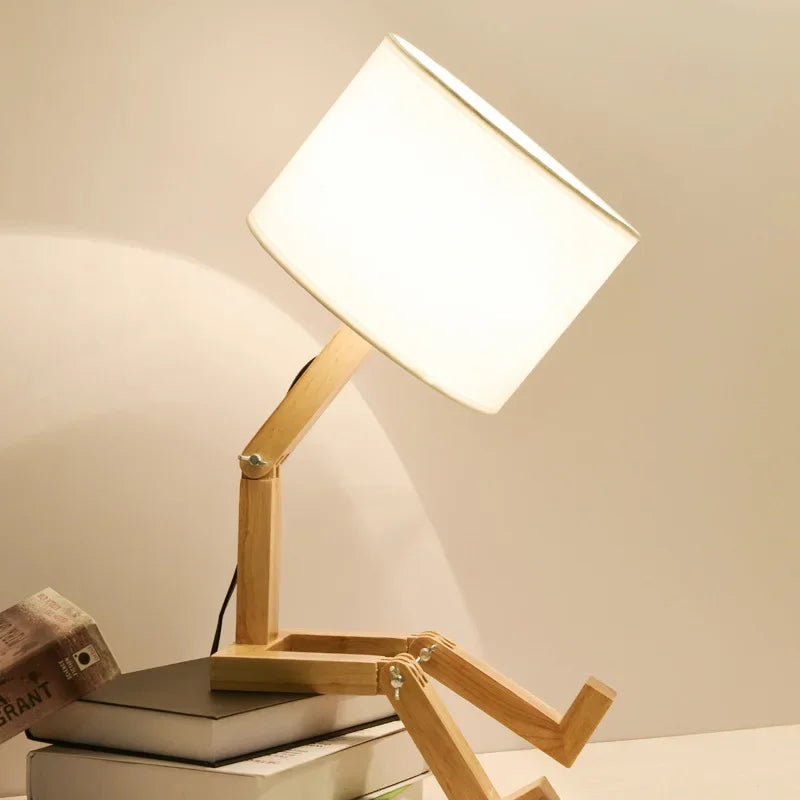 Unique adjustable wooden lamp with movable arm, fabric shade & base storage. Modern lighting for any room.