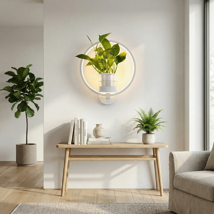Modern wall-mounted planter lamp with soft glow, perfect home decor for indoor greenery.