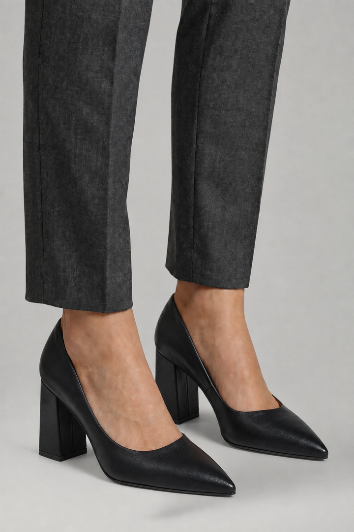 Versatile women's pointed toe pumps with a stable block heel; elegant slip-on design for any occasion.