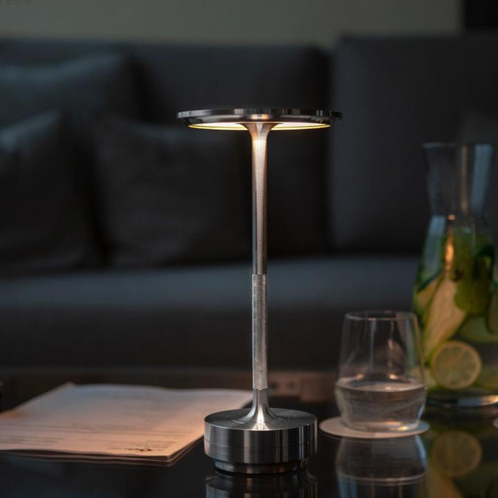 Adjustable cordless metal table lamp with IP66 waterproof, sleek modern design, crafted from high-grade metals, touch control