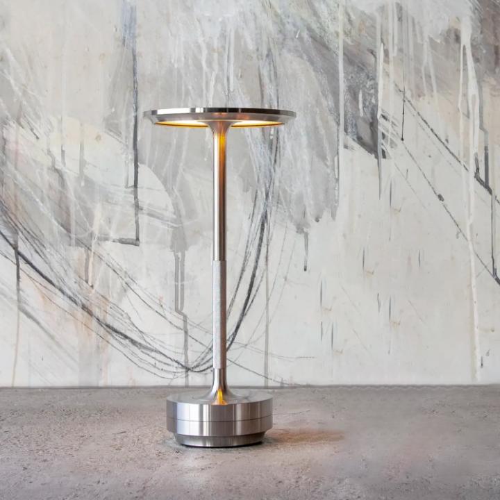 Adjustable cordless metal table lamp with IP66 waterproof, sleek modern design, crafted from high-grade metals, touch control