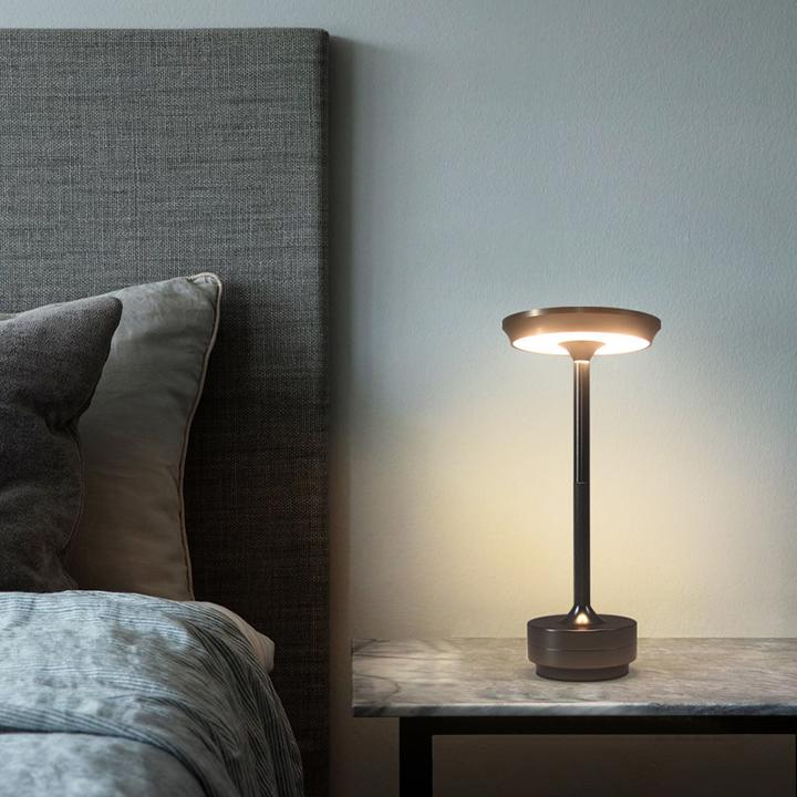 Adjustable cordless metal table lamp with IP66 waterproof, sleek modern design, crafted from high-grade metals, touch control