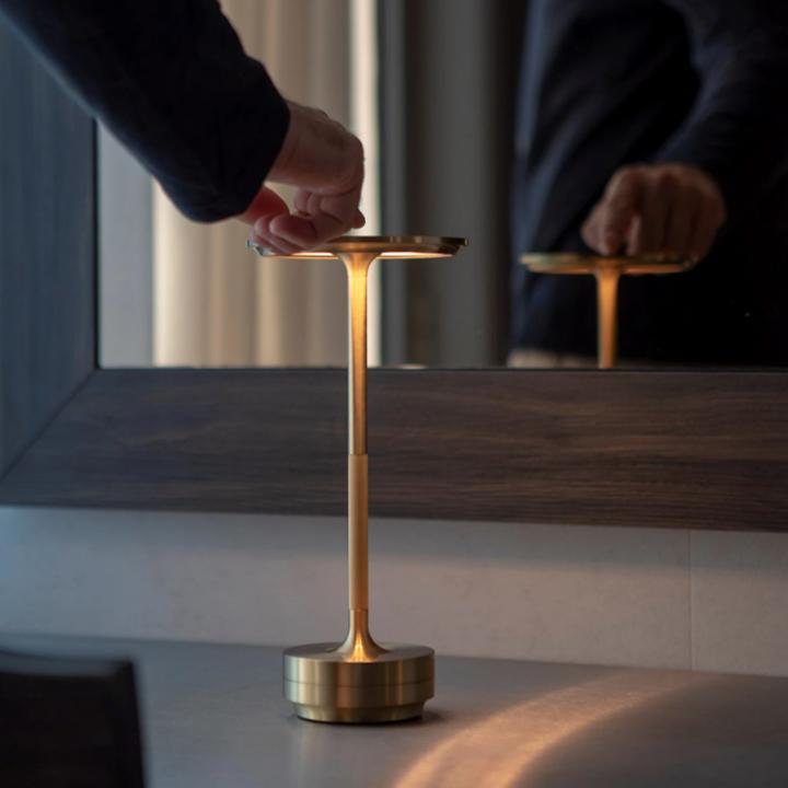Adjustable cordless metal table lamp with IP66 waterproof, sleek modern design, crafted from high-grade metals, touch control
