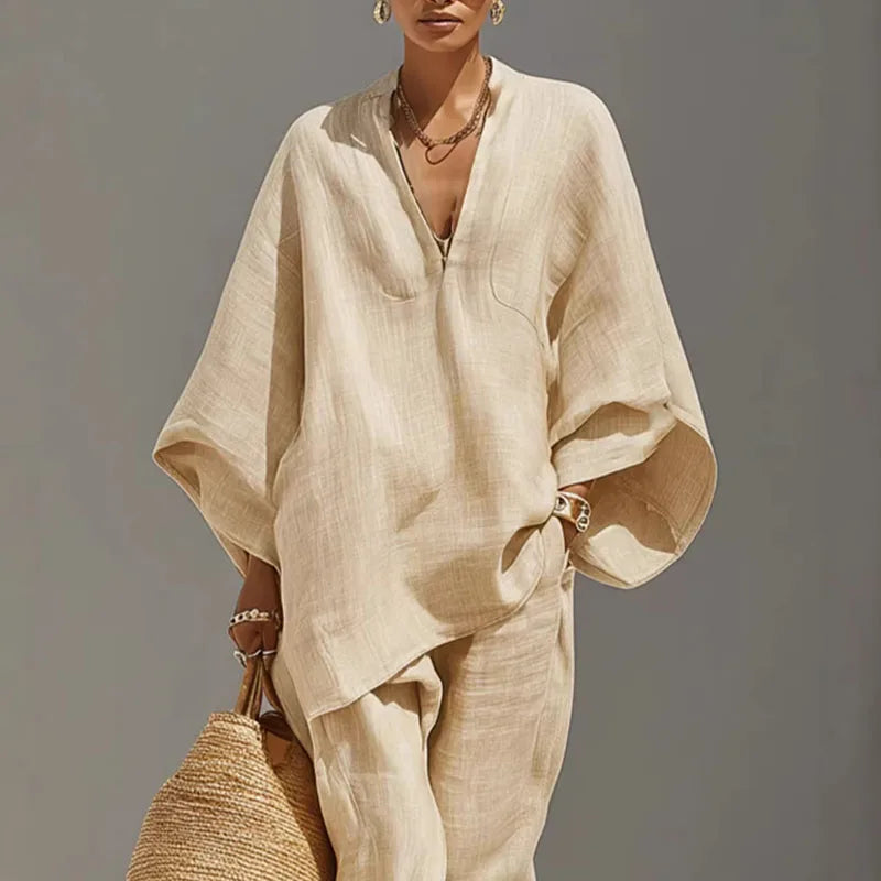 Apricot linen matching set with batwing top & tapered pants for women. Effortless casual chic two-piece outfit.