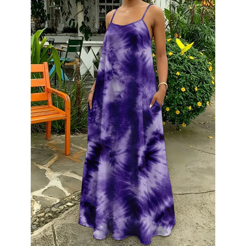 Long tie-dye maxi dress for women with delicate straps, a comfortable and flowing summer beach dress.
