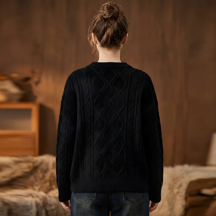 Cozy cable knit women's pullover sweater, vintage 90s style, oversized fit for casual winter wear.