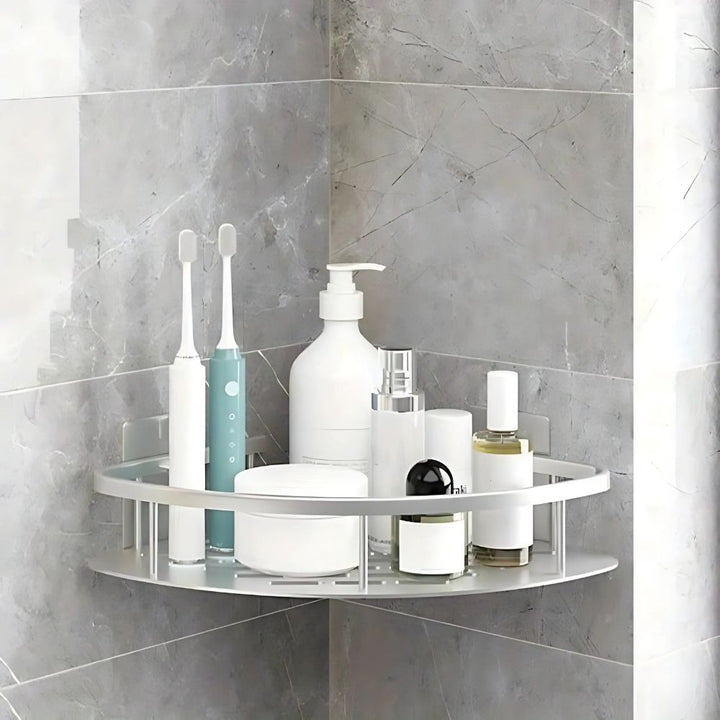 Sleek silver 1-tier wall-mounted shower caddy. Rustproof metal bathroom shelf for shampoo & bath accessories.