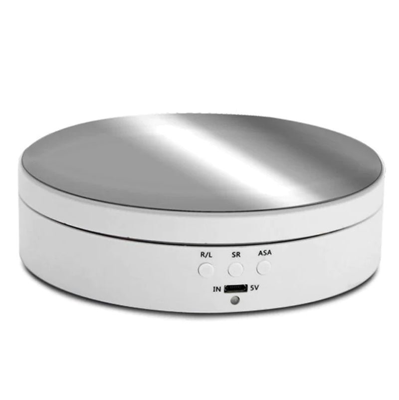 "Black electric motorized rotating display stand, round base, showcasing 360° rotation for professional photography setups."