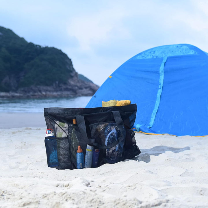 Extra-large black mesh beach tote bag. Zippered, sandproof, & durable. Essential family outdoor gear carryall.