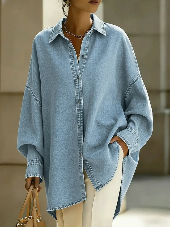 Effortless black women's long sleeve top, featuring a loose, relaxed fit for ultimate casual comfort.
