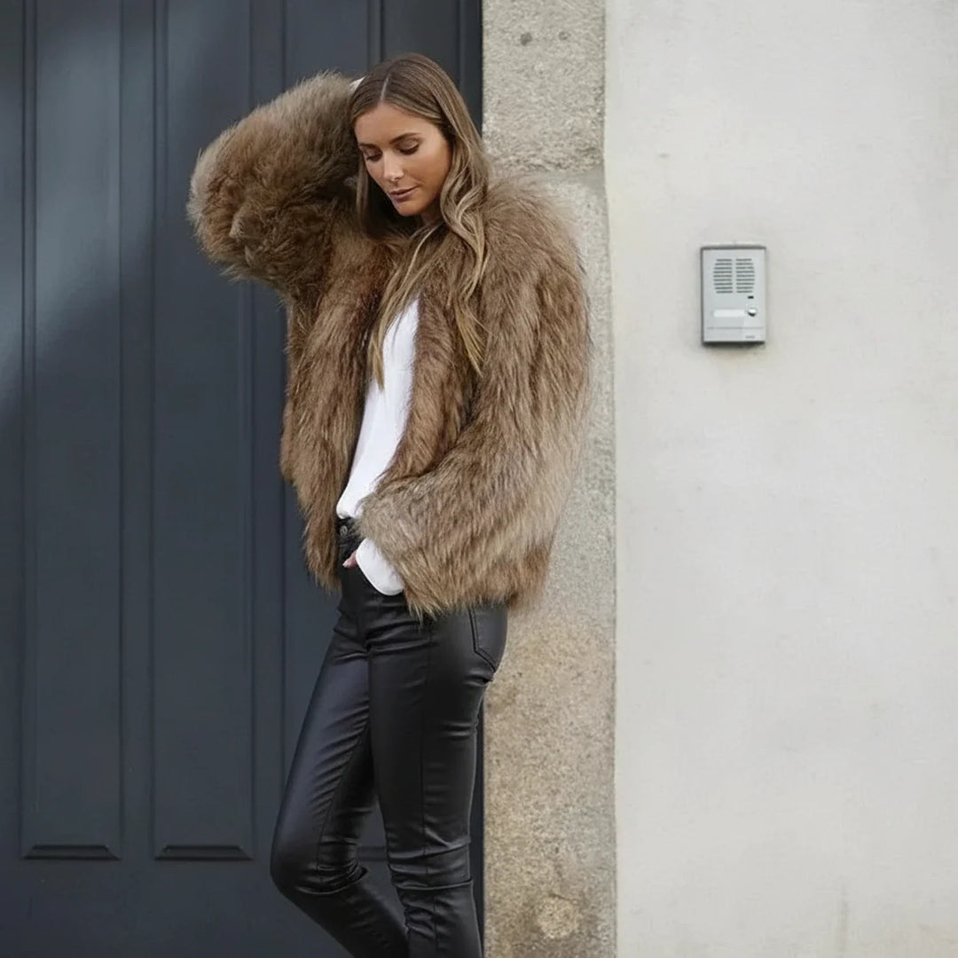 Cozy brown cropped jacket for women. Stylish outerwear, a perfect fashion statement piece for casual or evening wear.