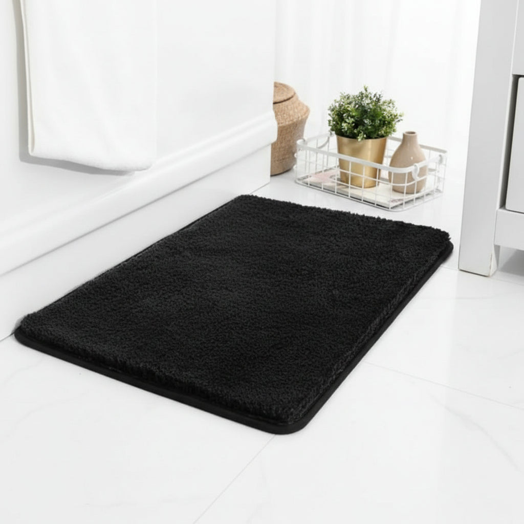 Elegant absorbent bath mat in a modern bathroom setting. Soft, non-slip bathroom accessory for safety & style.