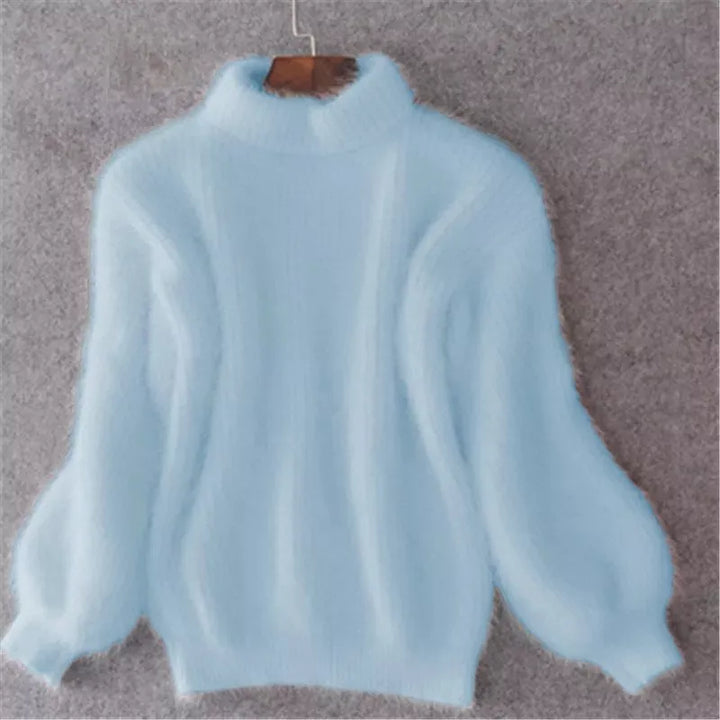 Stylish women's cozy sweater, a soft long sleeve pullover top perfect for fall and winter warmth.