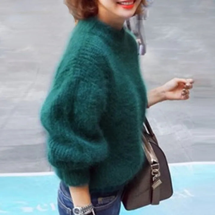 Versatile women's stylish long sleeve sweater. Cozy knit pullover for comfortable everyday wear and warmth.
