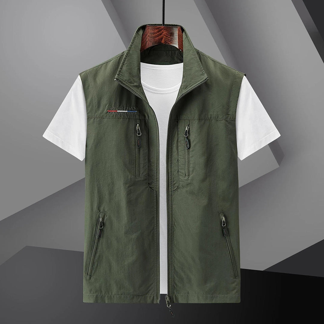 Durable men's lightweight outdoor vest with many pockets. Ideal for adventure, fishing, and travel comfort.