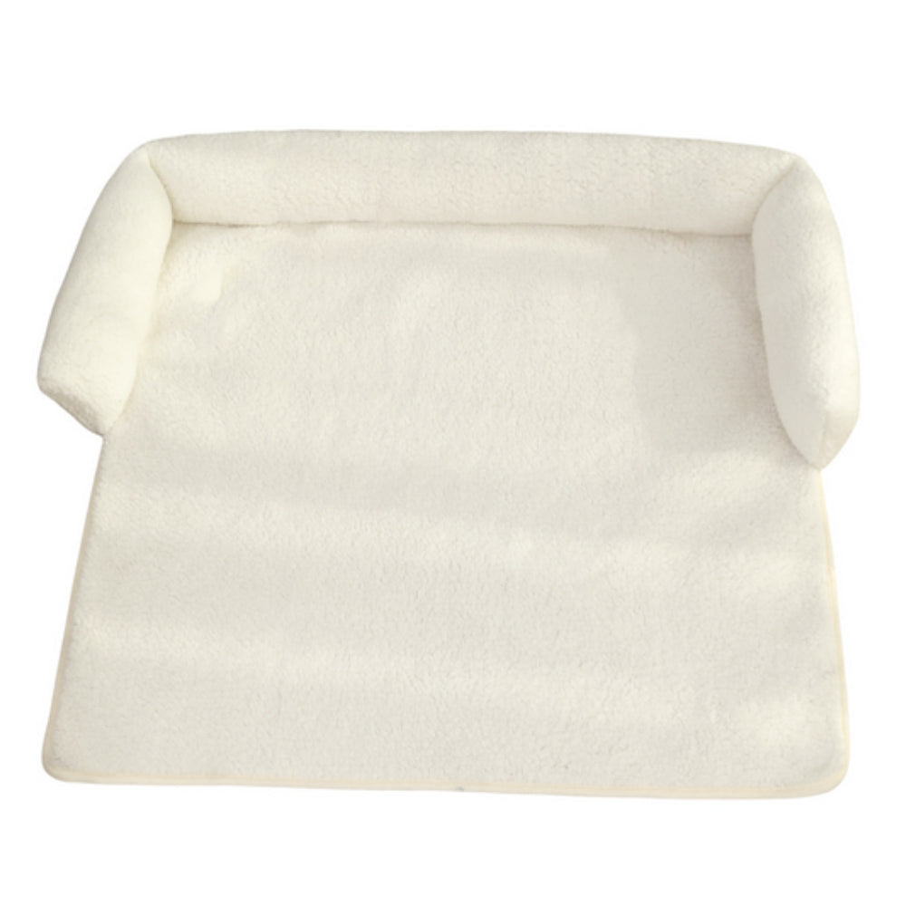 Pink non-slip dog blanket with ergonomic neck pillow, providing cozy comfort for cats and small dogs.