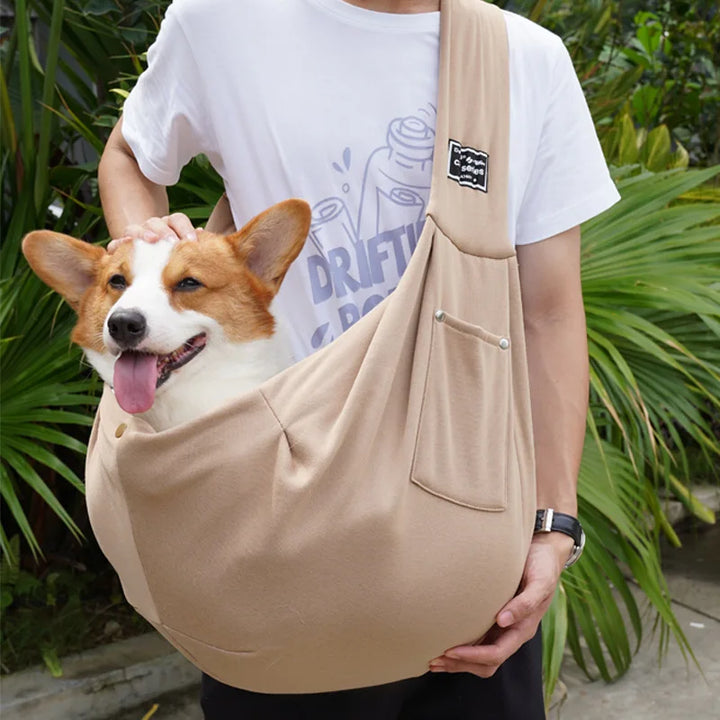 Breathable comfort pet sling for small dogs & cats, ensuring cozy, hands-free travel. Ideal for outdoor adventures.
