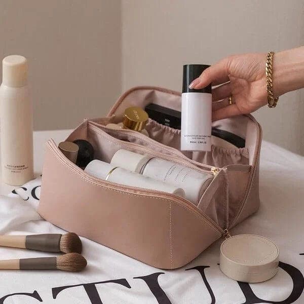 New women's cosmetic organizer bag. Features multiple compartments, ideal for makeup, toiletries & travel storage. Available in beige, brown, pink.
