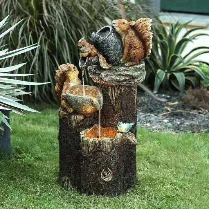 Eco-friendly solar duck & squirrel garden fountain with LED light. Weatherproof resin for charming outdoor & patio decor.