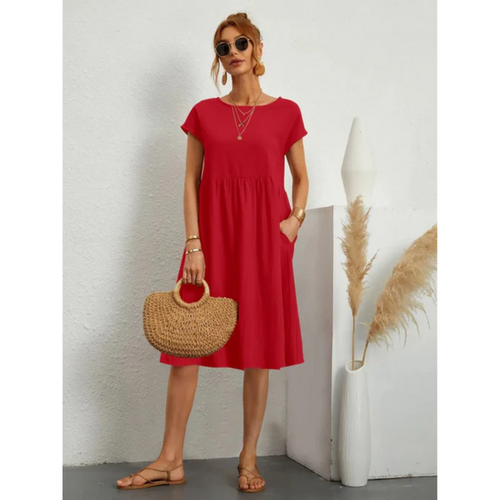 Chic women's A-line midi dress with cap sleeves & pockets, perfect for summer casual wear.