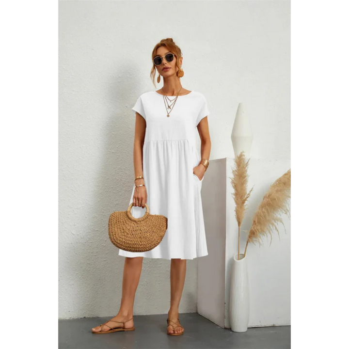 Women's chic cap sleeve A-line midi dress, comfortable with pockets, perfect for elegant summer days.