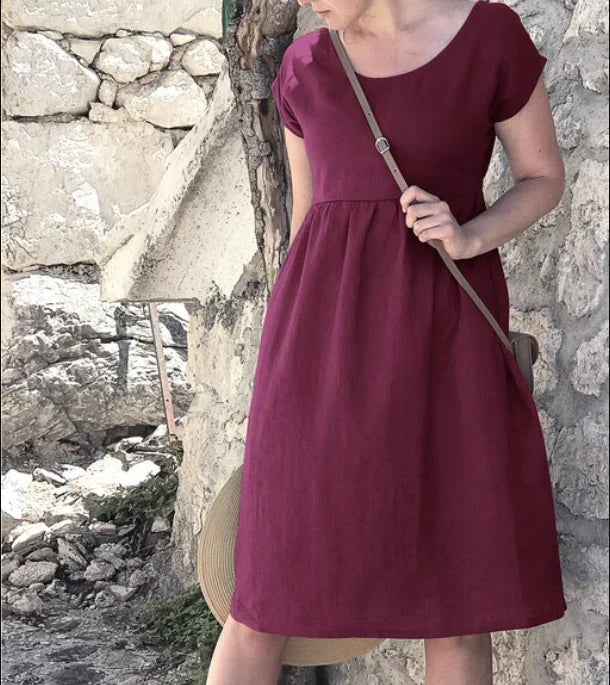 Elegant women's midi dress with cap sleeves & pockets, A-line cut, chic and comfortable for summer.