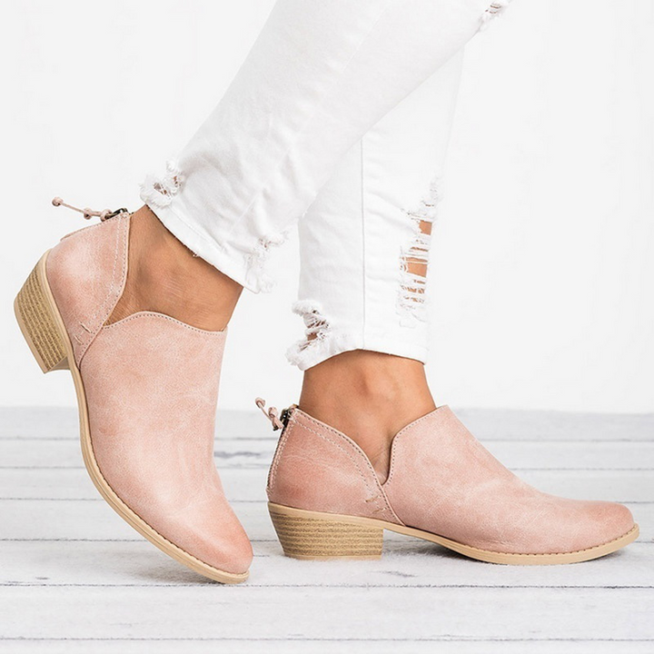 Versatile chic women's ankle boots with a comfortable low block heel & practical back zip, ideal for women's fashion.