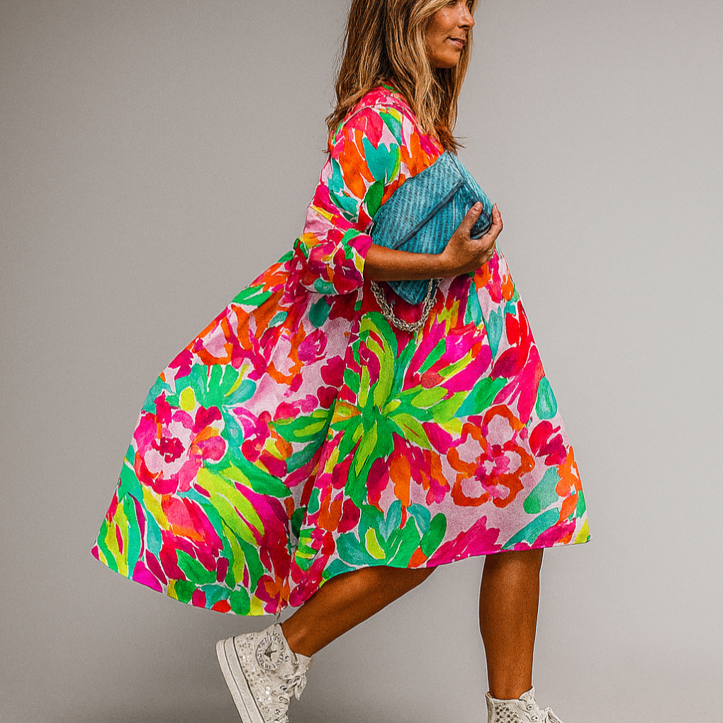 Chic Women's floral print midi shirt dress with puff sleeves. Perfect for summer casual or spring garden parties.