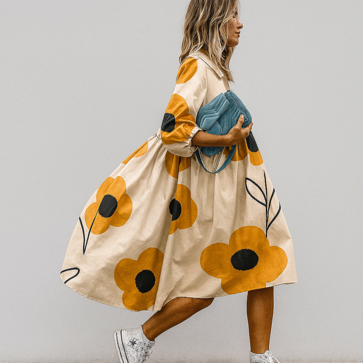 Elegant A-line floral midi dress for women, featuring a chic print & flattering oversized fit. Ideal for spring fashion.