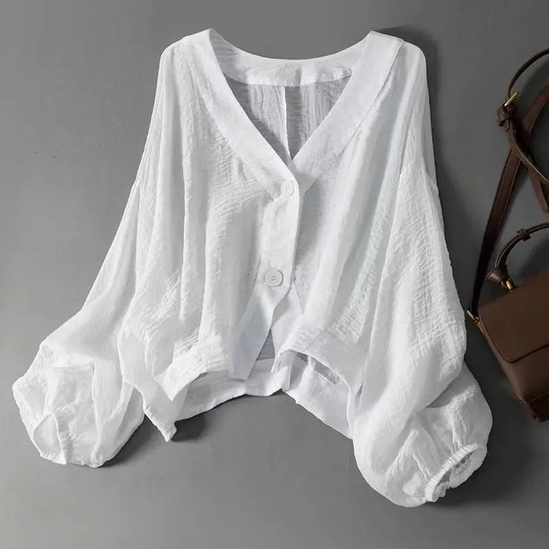 Chic women's flowy batwing summer blouse with loose fit, perfect for casual everyday fashion.