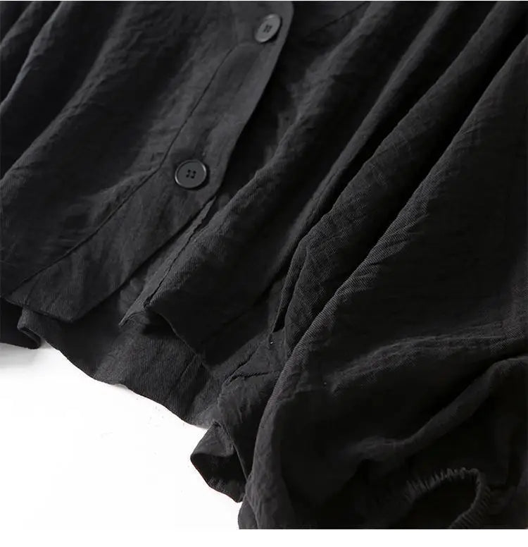 Flowy women's batwing summer blouse, a comfortable loose-fit top with stylish button detail for casual wear.