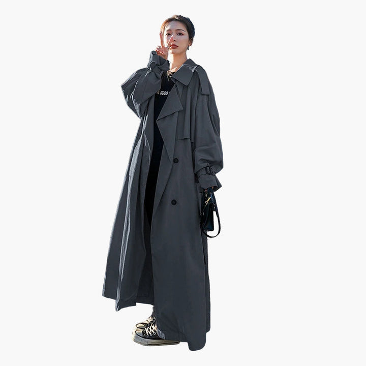 Chic women's loose-fit trench coat in a long length, perfect for casual spring or fall outerwear.
