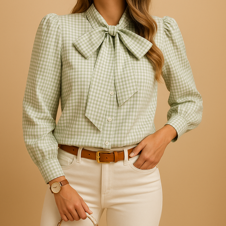 Comfortable red plaid blouse for women, featuring a stylish bow detail. Perfect all-season chic top.