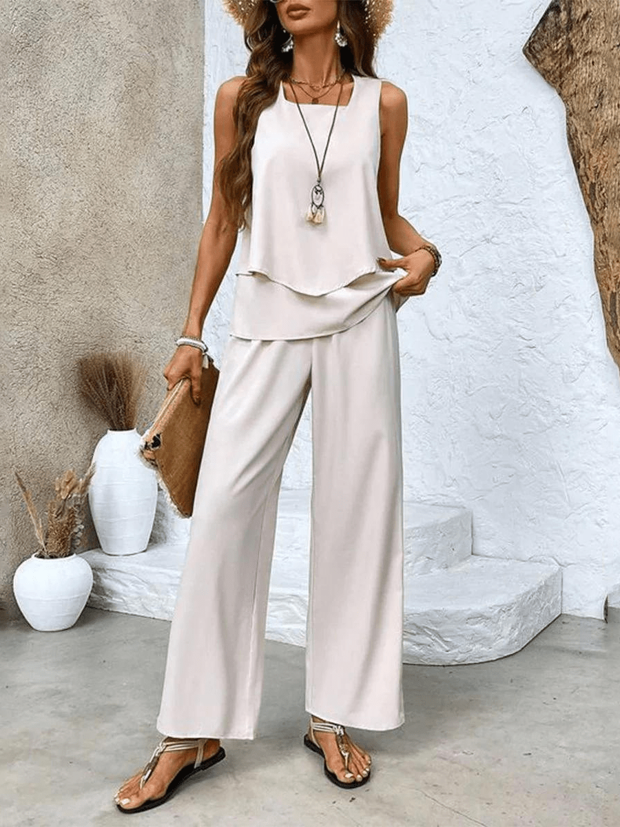 Lightweight & breezy women's summer set. Flowy top & wide-leg pants ensemble for relaxed elegance.