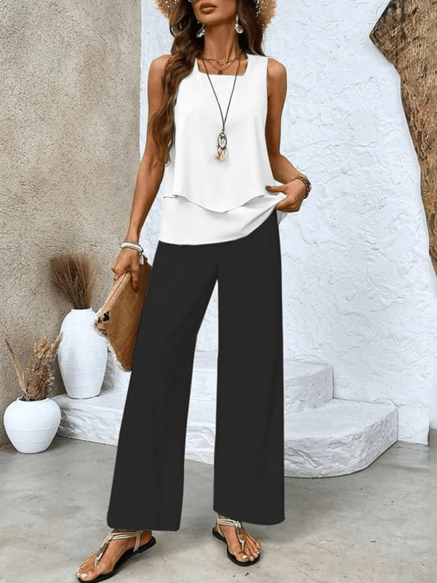 Women's two-piece set for summer: chic flowy top & comfortable wide-leg pants. A stylish ladies' ensemble.