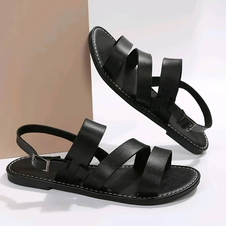 Versatile women's three-strap flat sandals. Chic open-toe design, essential comfortable footwear for summer casual style.