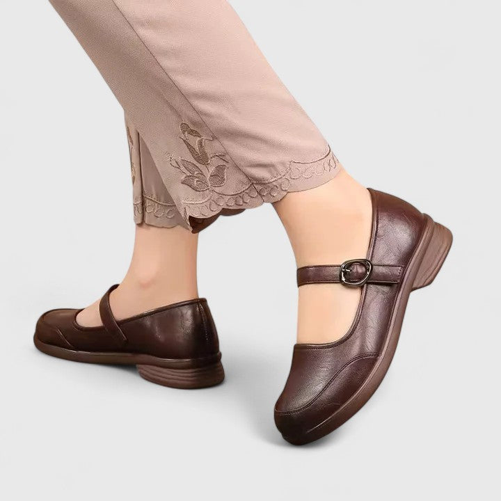 Close-up of the elegant buckle detail on women's classic spring flats