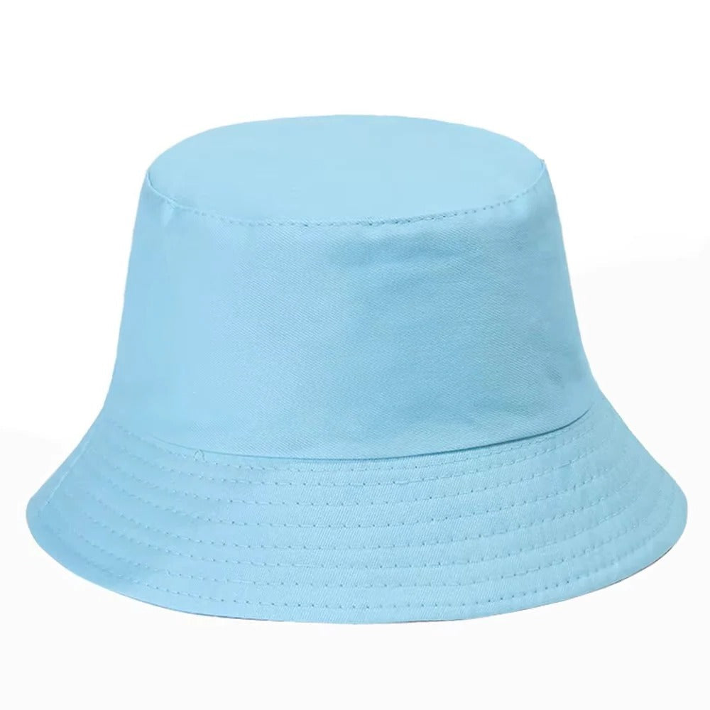 Trendy unisex denim bucket hat, packable for travel, made from cool cotton for summer comfort.