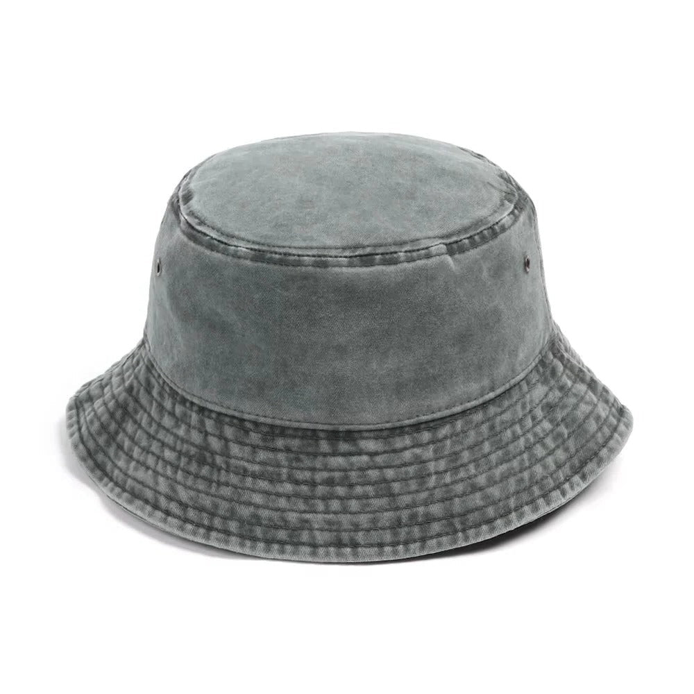 Chic unisex denim bucket hat, comfortable cotton material, great for sunny days and everyday style.