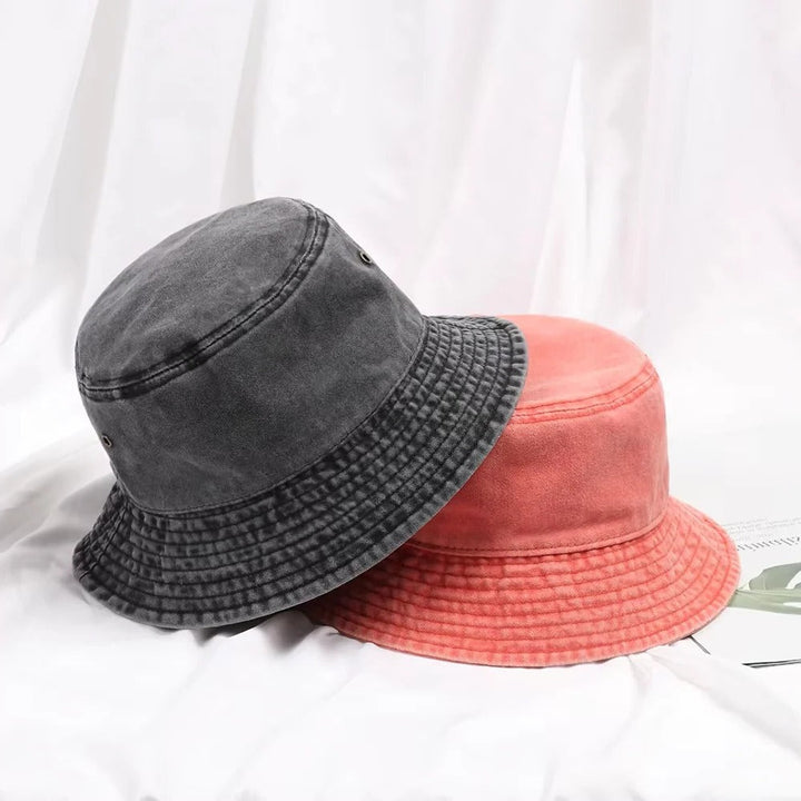 Stylish packable denim bucket hat, comfortable cotton fabric, great for casual wear and summer adventures.
