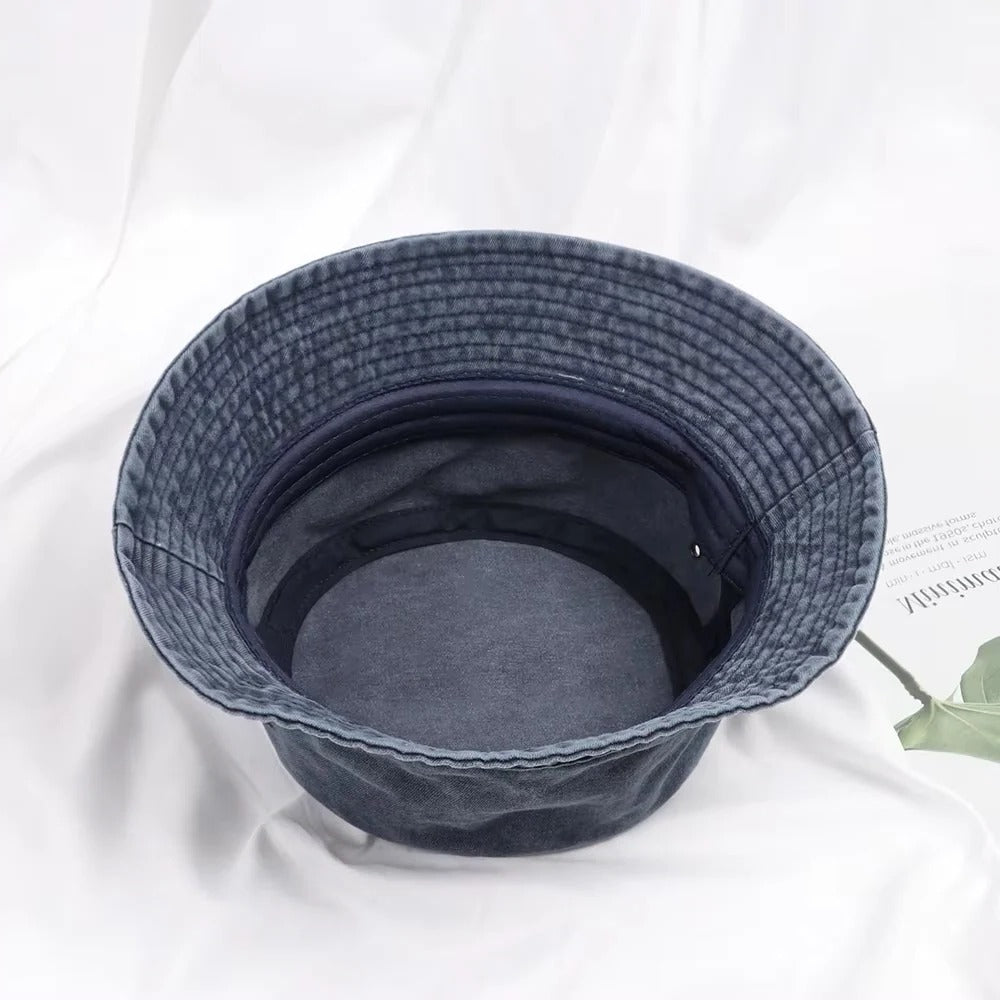 Casual unisex denim bucket hat, soft cotton for all-day comfort, essential summer and outdoor accessory.