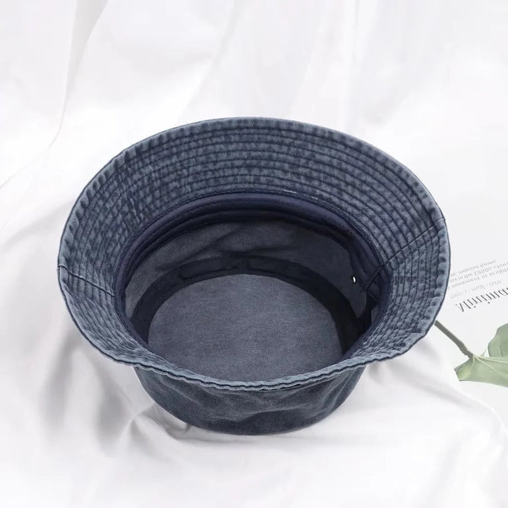 Casual unisex denim bucket hat, soft cotton for all-day comfort, essential summer and outdoor accessory.