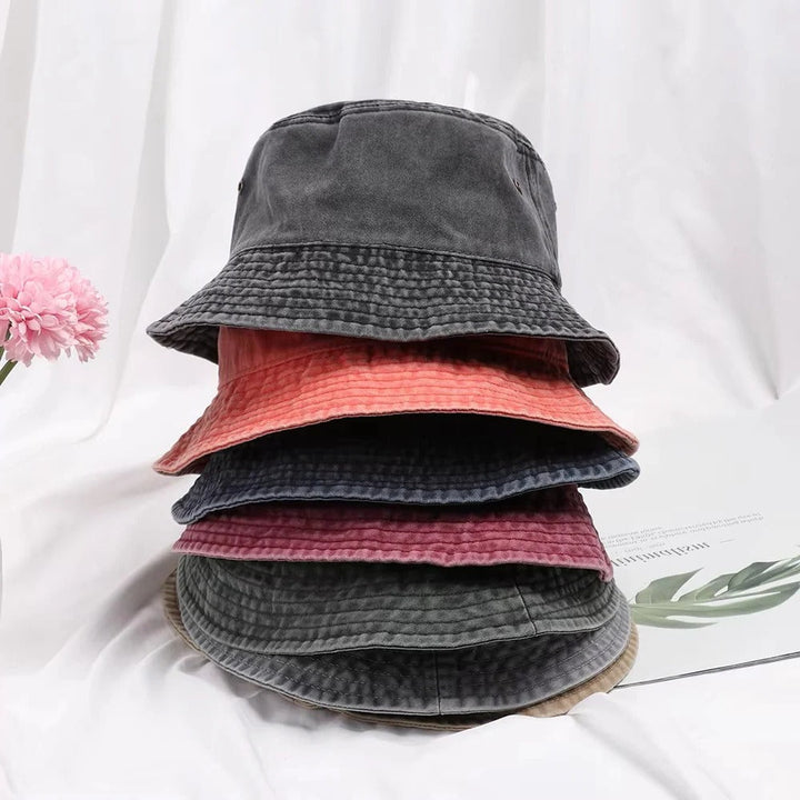 Blue denim bucket hat, 100% cotton, unisex design for comfortable sun protection during outdoor fun.