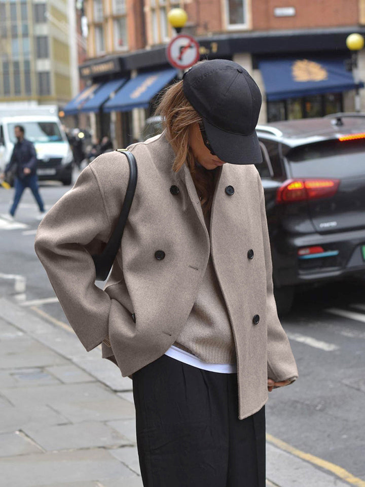 Fashionable women's double-breasted trench coat, a classic style staple for any season